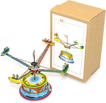 Small Rocket Carousel. Tin Toy / retro / clockwork fairground toy