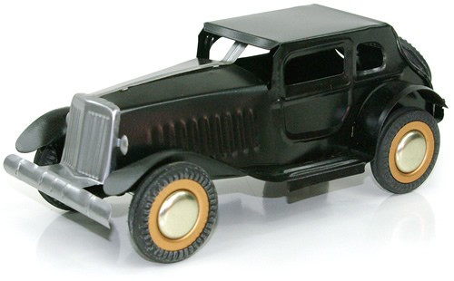 Classic Black Automobile. Tin Toy / retro / clockwork toy car