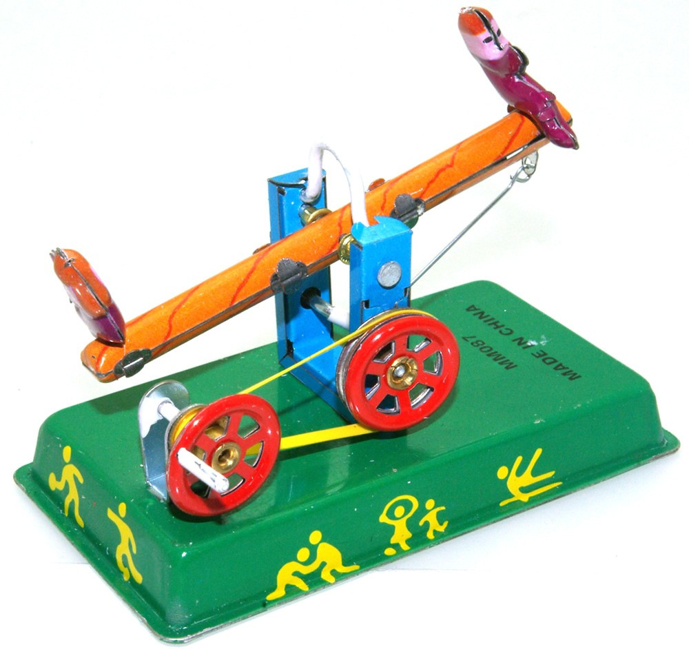 Seesaw tin toy