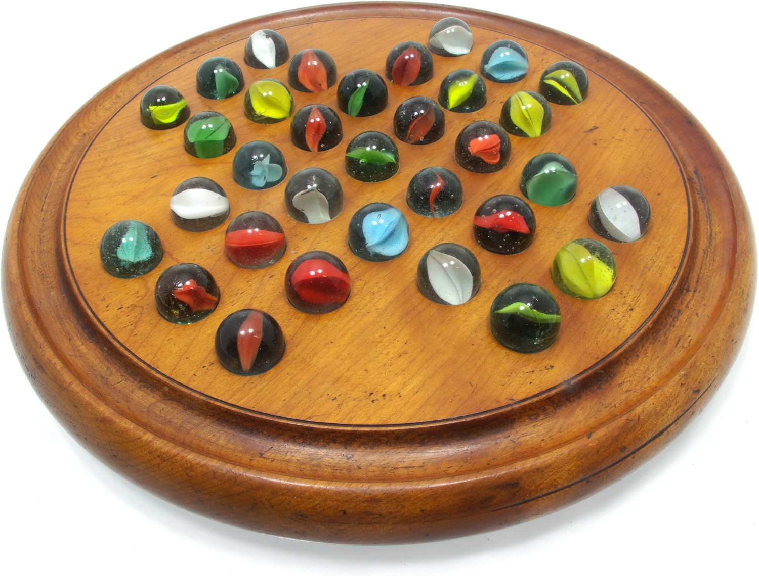 Antique wooden peg solitaire game