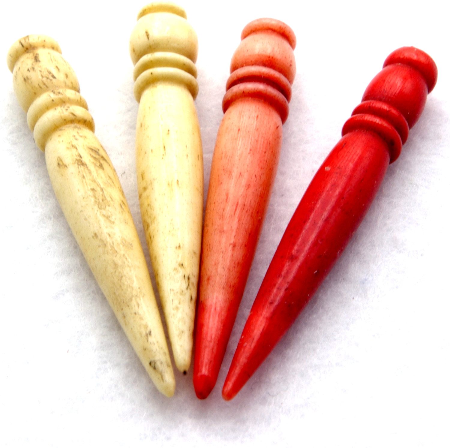 Turned bone cribbage pegs