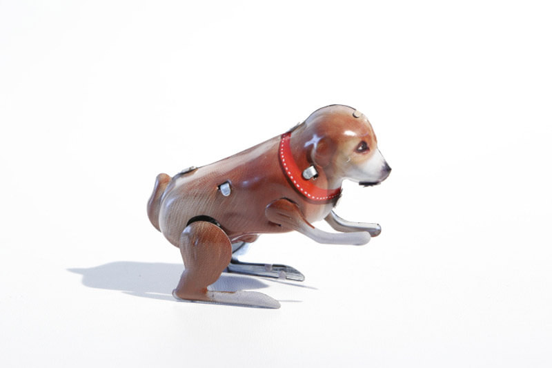 Tin toy jumping dog